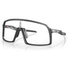 OO9406-9837 Oakley Sutro Sunglasses Matte Carbon Frame, Clear to Black Iridium Photochromic Lens